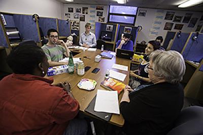 Landmark College students and professor in classroom. 