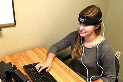 Student wearing a fNIRS sensor